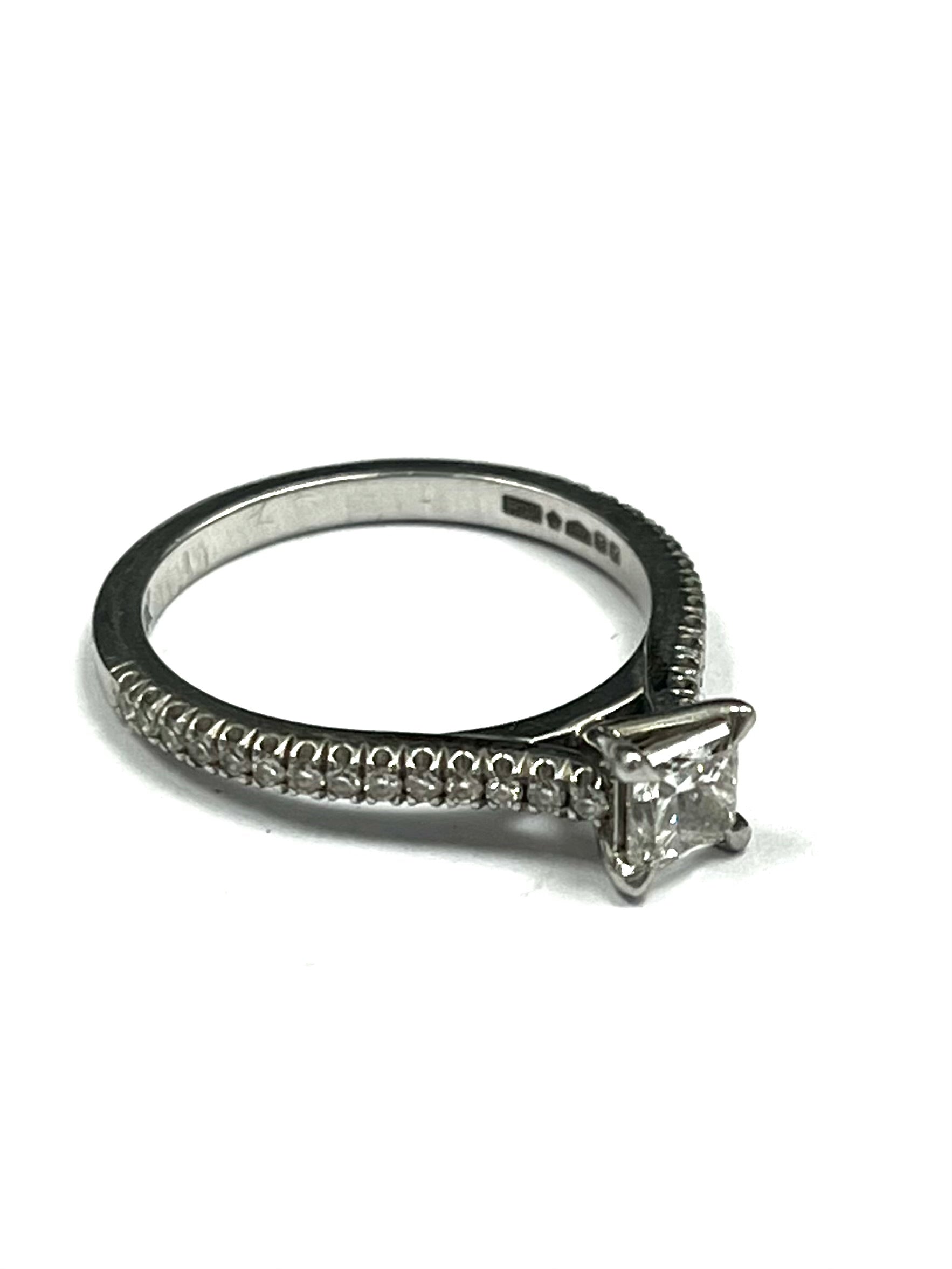 Platinum Hallmarked 0.50cts Princess cut GIA certificated stone. Total diamond weight 0.72cts.
