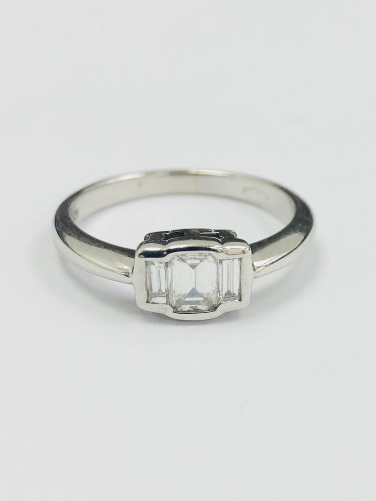 18ct White Gold Emerald Cut three stone Diamond ring. 0.60cts